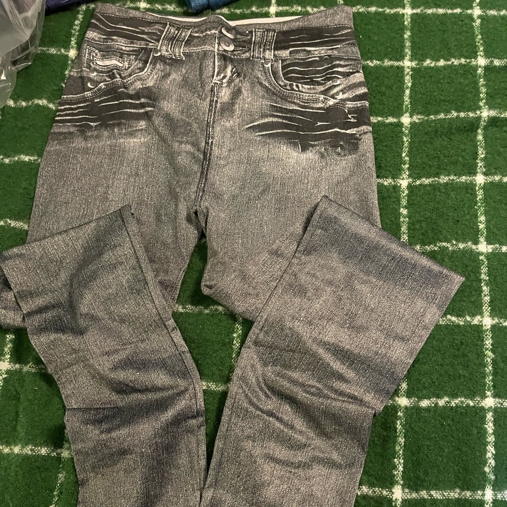 Genie Jeggings 2 blue 2 black gently used.